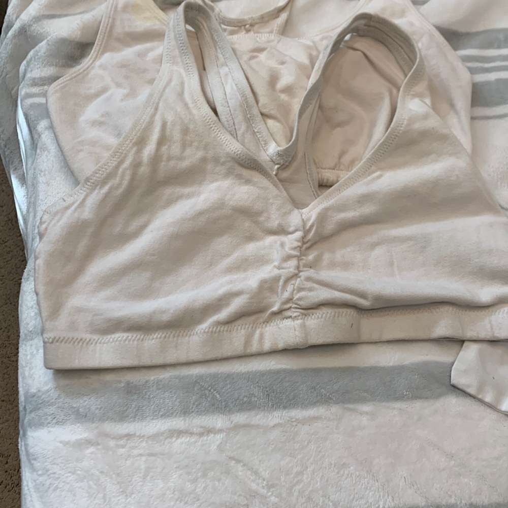 2 white sports bras